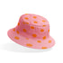 Patrón de pepas naranjas sobre fondo rosado