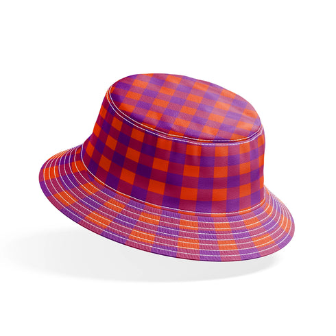 Patrón de cuadros en tonos morado, naranja y vino tinto con diseño geométrico repetitivo
