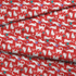 Patrón de gatos blancos dibujados a mano sobre fondo rojo con estrellas de mar azules y turquesa fabric fold mockup