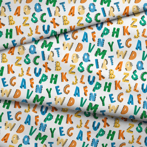 Patrón colorido de letras del alfabeto con diseños estilo dinosaurio en tonos azul, verde, amarillo y naranja sobre fondo blanco. fabric fold mockup