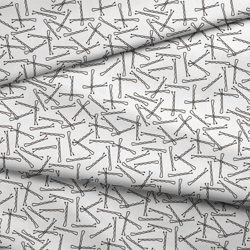Patrón de líneas y formas abstractas en blanco y negro que asemejan horquillas o clips dispersos aleatoriamente sobre fondo claro. fabric fold mockup