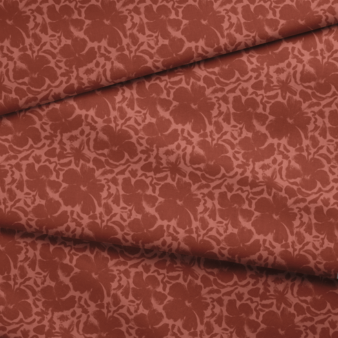 Red-brown floral pattern with abstract flowers on a lighter coral background fabric fold mockup