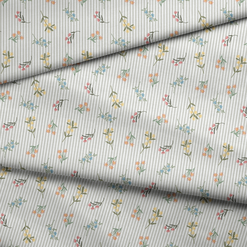 Patrón delicado de flores pequeñas en tonos rosado, amarillo y azul sobre fondo gris con rayas blancas fabric fold mockup