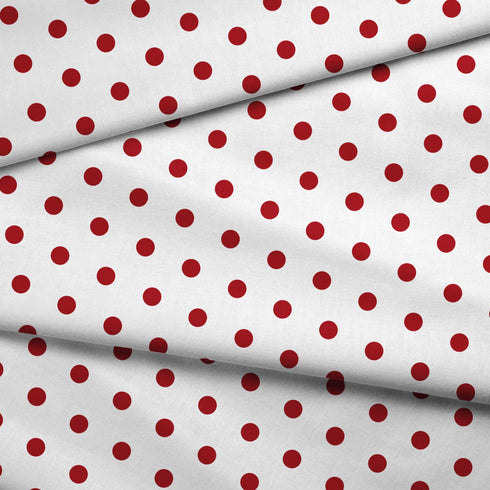 Patrón de pepas rojas sobre fondo blanco