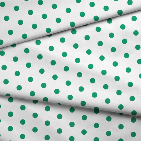Patrón de pepas verdes azuladas sobre fondo blanco