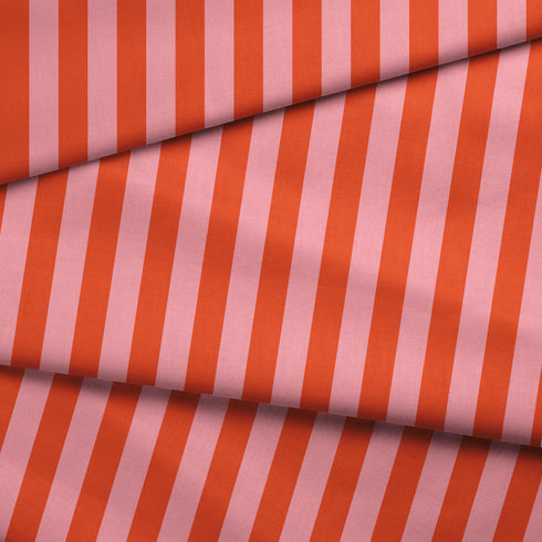 Rayas verticales en naranja quemado, rosado pálido y coral sobre fondo claro