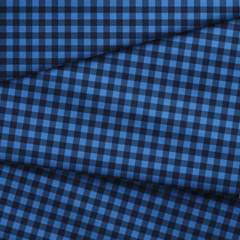 Patrón de cuadros en tonos azules y negro con efecto pixelado geométrico