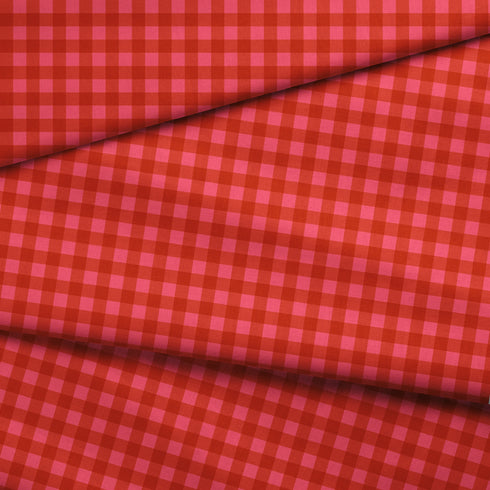 Patrón de cuadros en tonos rosados y rojos vibrantes