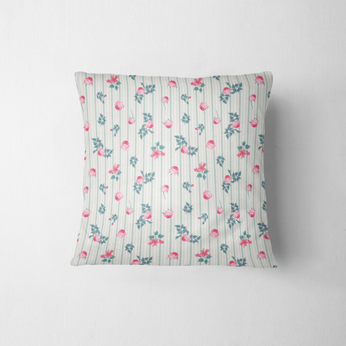 Patrón floral con rosas rosadas sobre fondo de rayas verticales grises y blancas fabric pillow mockup
