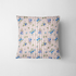 Patrón floral con rosas azules sobre fondo de rayas rosadas y blancas verticales delicadas fabric pillow mockup