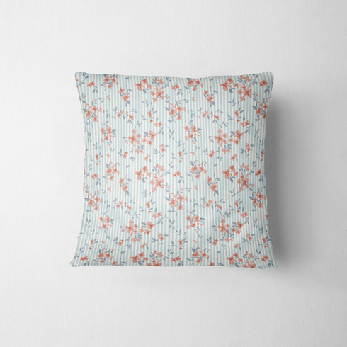 Patrón floral coral y gris sobre rayas azul cielo, flores delicadas con hojas decorativas fabric pillow mockup
