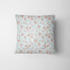 Patrón floral coral y gris sobre rayas azul cielo, flores delicadas con hojas decorativas fabric pillow mockup