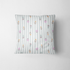 Patrón de rayas verticales gris con pequeños motivos florales en rosado, naranja y verde agua dispersos fabric pillow mockup