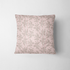 Patrón rosado con rayas verticales y estampado florales de ramas delicadas en gris fabric pillow mockup