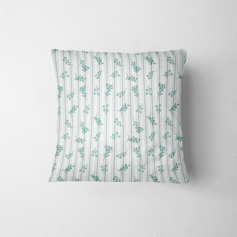 Patrón decorativo con rayas verticales y motivos florales de ramas verdes sobre fondo blanco fabric pillow mockup