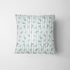 Patrón decorativo con rayas verticales y motivos florales de ramas verdes sobre fondo blanco fabric pillow mockup