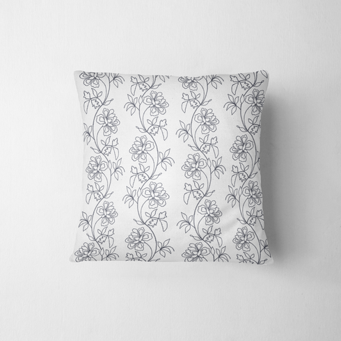 Patrón estampado floral con flores y hojas sobre fondo blanco, diseño botánico delicado fabric pillow mockup