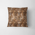 Estampado animal print con leopardo, serpientes y motivos abstractos en tonos café, negro y crema fabric pillow mockup
