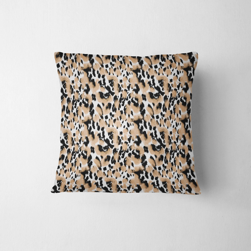 Estampado animal print en negro, café y blanco con manchas difuminadas estilo leopardo fabric pillow mockup