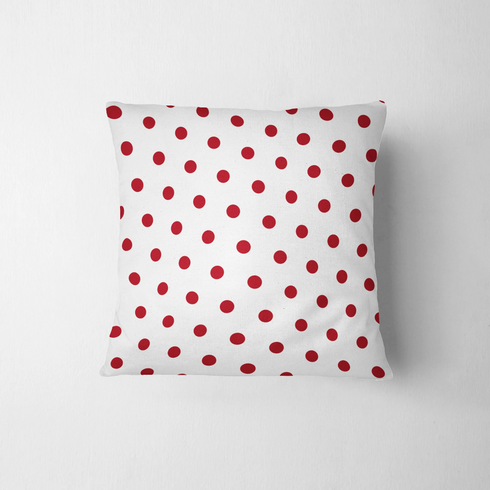 Patrón de pepas rojas sobre fondo blanco