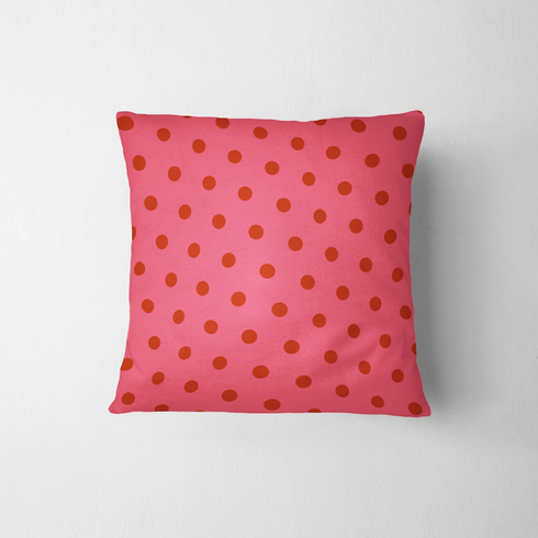 Fondo rosado con pepas café distribuidas uniformemente
