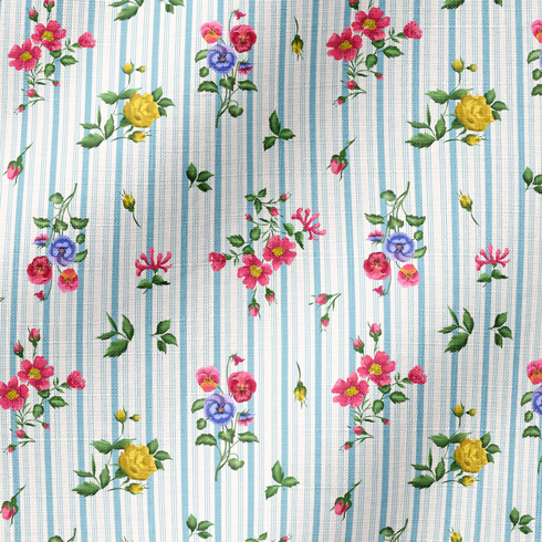 Patrón floral con rosado, amarillo y azul sobre rayas verticales azules y blancas fabric ripple mockup