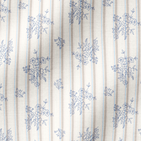 Patrón de rayas verticales con motivos florales delicados en tonos azules sobre fondo crema fabric ripple mockup