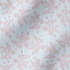 Patrón de rayas verticales azul cielo con delicadas flores rosado pálido dispersas fabric ripple mockup