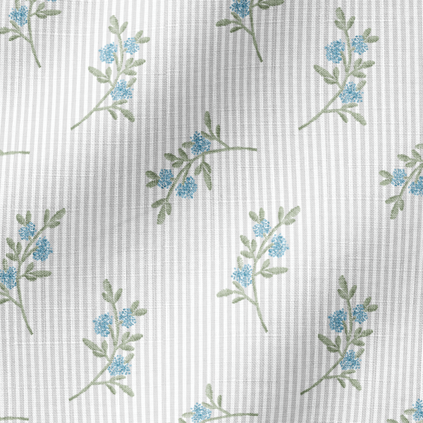 Patrón floral azul con ramas delicadas sobre fondo de rayas blancas y grises, estilo botánico fabric ripple mockup