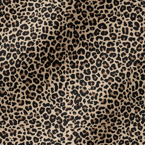 Estampado animal print de leopardo en café y beige sobre fondo negro fabric ripple mockup