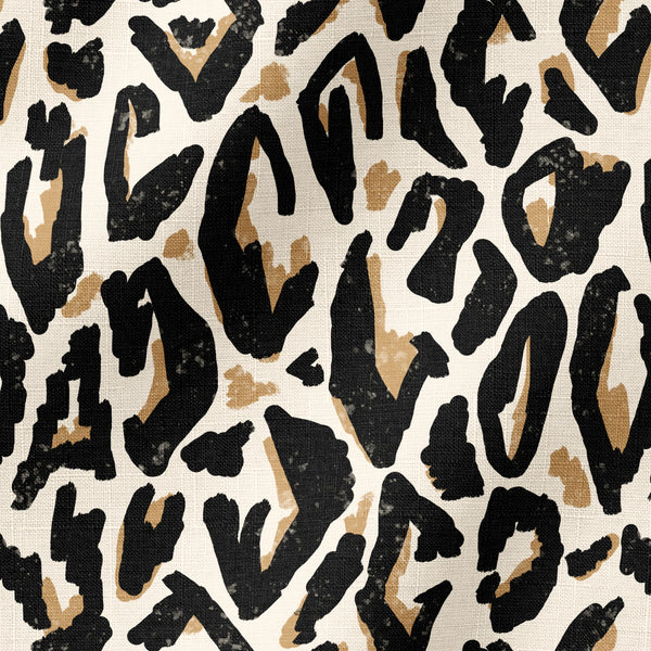 Estampado abstracto negro y dorado con formas orgánicas irregulares sobre fondo crema fabric ripple mockup