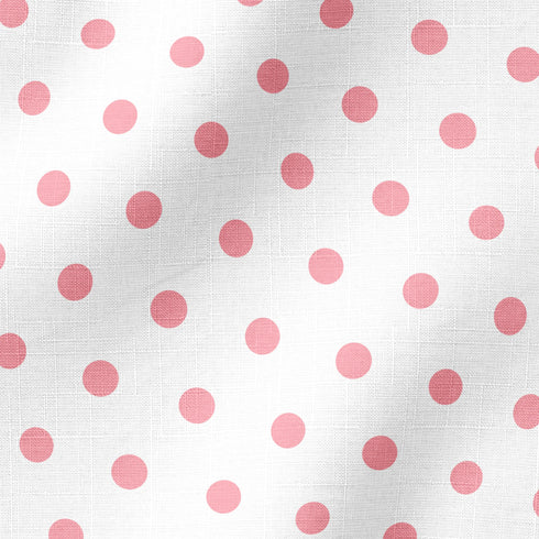 Patrón de pepas rosadas sobre fondo blanco