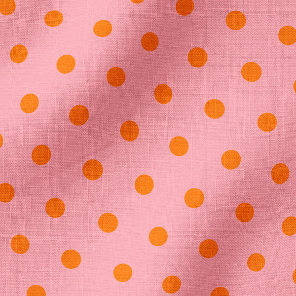 Patrón de pepas naranjas sobre fondo rosado