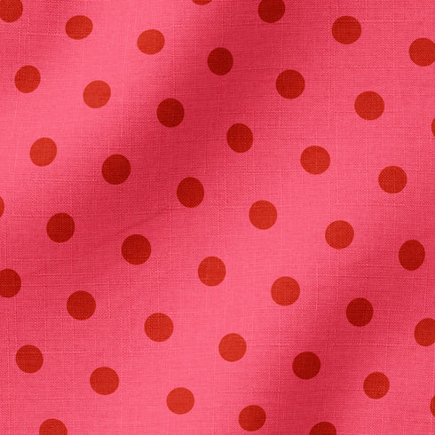 Fondo rosado con pepas café distribuidas uniformemente