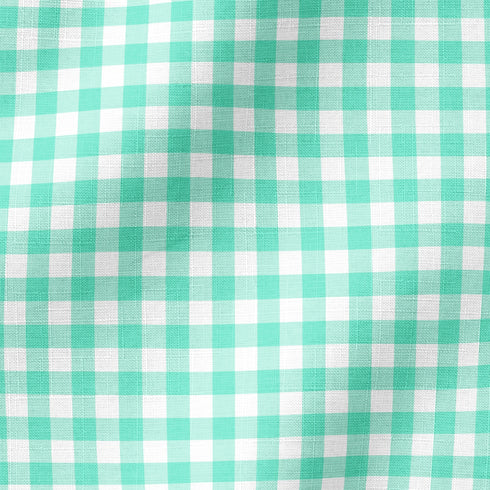 Patrón de cuadros turquesa y verde menta sobre fondo blanco en diseño geométrico regular