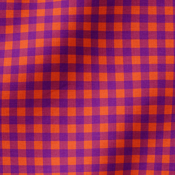 Patrón de cuadros en tonos morado, naranja y vino tinto con diseño geométrico repetitivo