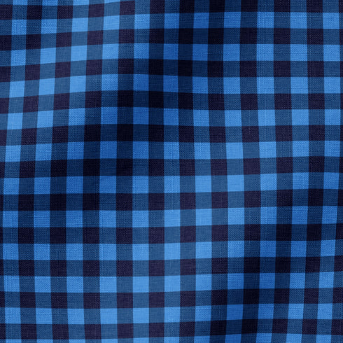 Patrón de cuadros en tonos azules y negro con efecto pixelado geométrico