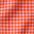 Patrón de cuadros en tonos rosados, rojos, naranjas y coral con efecto degradado