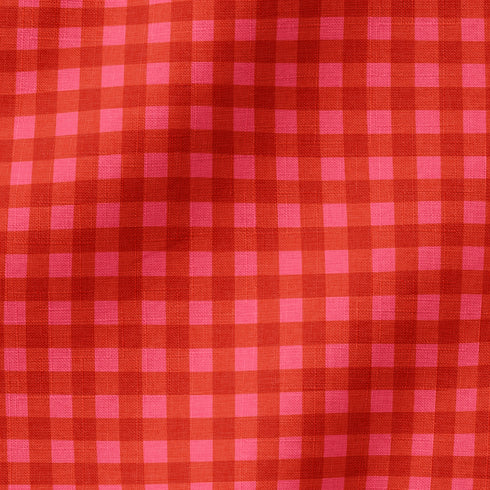 Patrón de cuadros en tonos rosados y rojos vibrantes