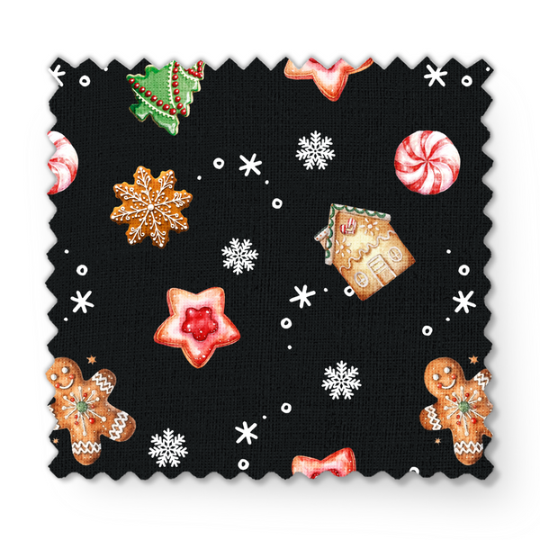 Patrón navideño con galletas decoradas en forma de estrellas, copos de nieve, árbol, casa y muñeco de jengibre sobre fondo negro. fabric swatch mockup