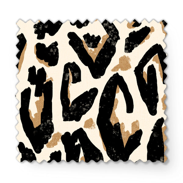 Estampado abstracto negro y dorado con formas orgánicas irregulares sobre fondo crema fabric swatch mockup