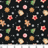 Patrón navideño con galletas decoradas en forma de estrellas, copos de nieve, árbol, casa y muñeco de jengibre sobre fondo negro. ruler cm