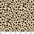 Patrón de pepas irregulares negras sobre fondo beige estilo animal print ruler cm