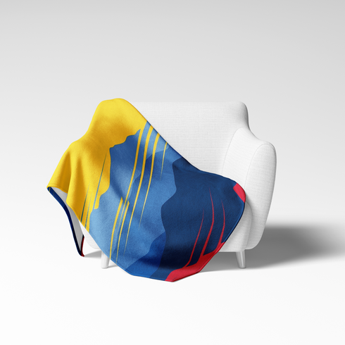 Montañas estilizadas en capas de azul y rojo con sol dorado, diseño gráfico inspirado en bandera colombiana sutex blanket chair new