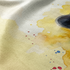 Cara de oso andino sobre fondo con salpicaduras amarillo azul rojo, texto "COLOMBIA un solo rugido sutex blanket detail new