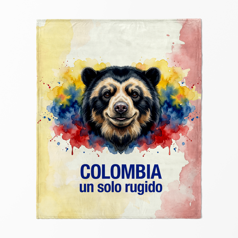 Cara de oso andino sobre fondo con salpicaduras amarillo azul rojo, texto "COLOMBIA un solo rugido sutex blanket fullview new