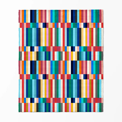 Franjas verticales multicolor vibrantes en bloques geométricos con tonos naranja, azul, verde, rosado, amarillo y café