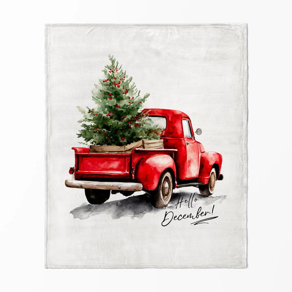 Camión Rojo Navideño con Árbol Cobija