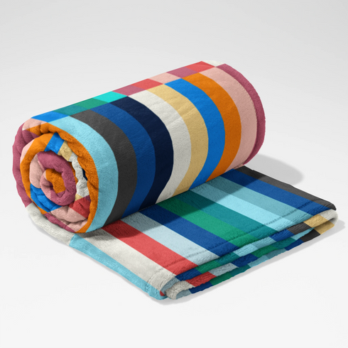 Franjas verticales multicolor vibrantes en bloques geométricos con tonos naranja, azul, verde, rosado, amarillo y café