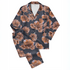 Flores estilizadas en tonos ocre y marrón sobre fondo negro oscuro, diseño artístico botánico decorativo sutex pajamas fullview mockup